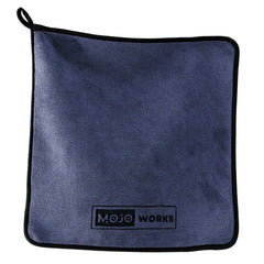 Blue microfiber fishing towel with black trim and Mojo Works logo, designed for surfcasting