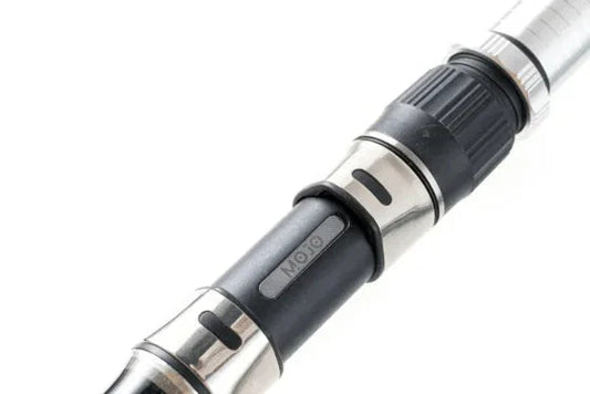 Close-up of Mojo surfcasting rod reel seat with black and silver detailing, high-performance fishing gear